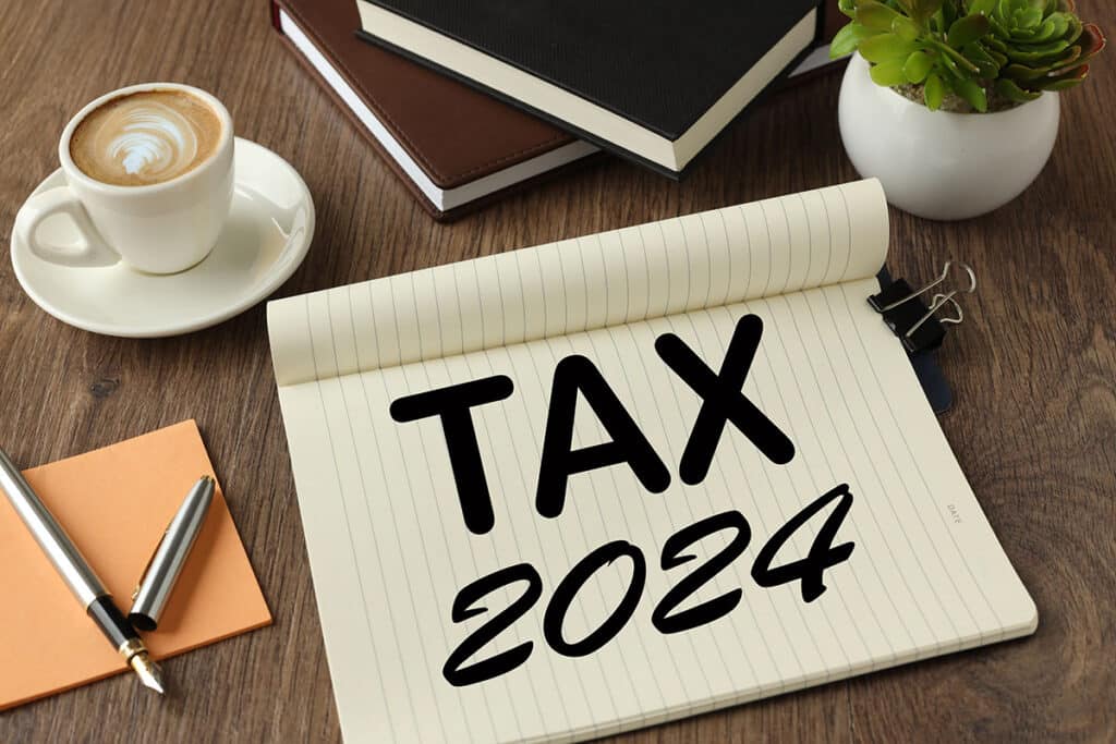 Notebook that says tax planning on it tax 2024